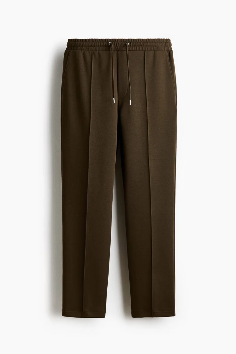 H&M  Regular Fit Interlock crease-front joggers for Men | Best Price UAE