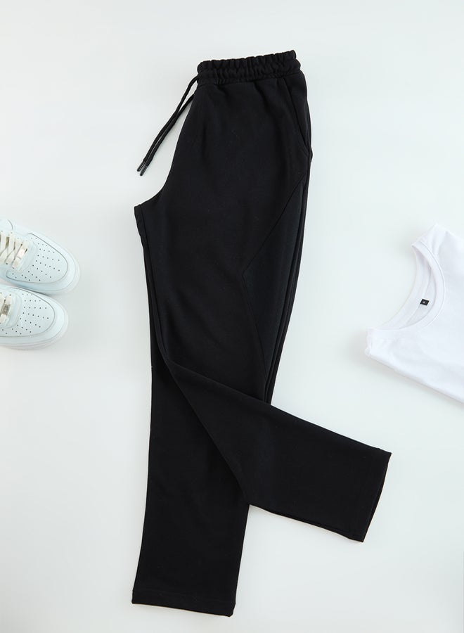 trendyol Black Regular Cut Pique Textured Fabric Detailed Sweatpants TMNAW25EA00010  - Image 2