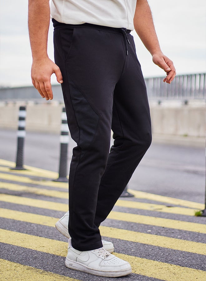 trendyol Black Regular Cut Pique Textured Fabric Detailed Sweatpants TMNAW25EA00010  - Image 4