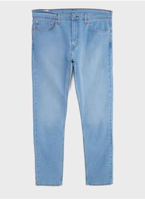 Mid Wash Tapered Fit Jeans