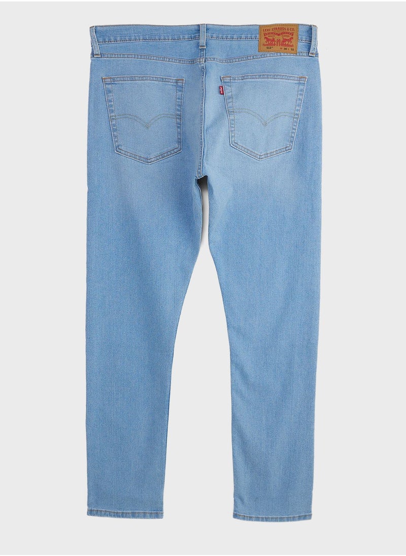 Levi's - Mid Wash Tapered Fit Jeans - Image 1