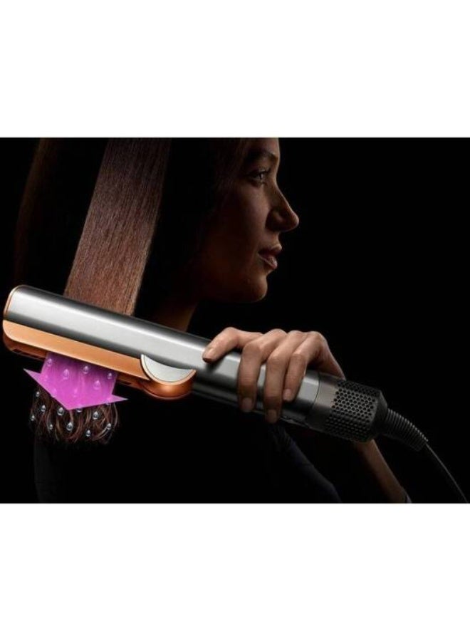 dyson Airstrait straightener.HT01 Kanzan Pink, Unwrap wet to dry straightening, with air. No hot plates. No heat damage.1 Powerful, directional airflow smooths and aligns hair. Straightens from wet to dry, simplifying your routine. For a natural straight finish. Kanzan Pink- International Version Kanzan Pink - Image 5