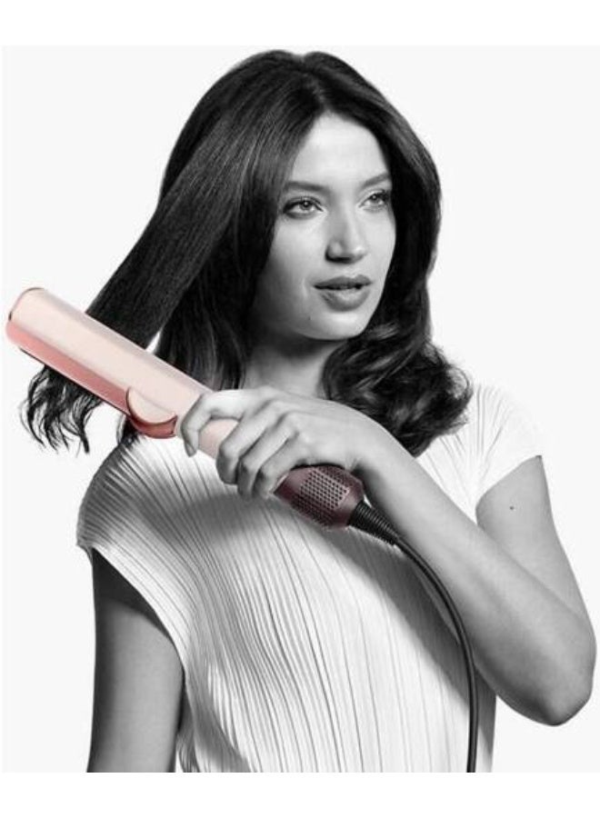 dyson Airstrait straightener.HT01 Kanzan Pink, Unwrap wet to dry straightening, with air. No hot plates. No heat damage.1 Powerful, directional airflow smooths and aligns hair. Straightens from wet to dry, simplifying your routine. For a natural straight finish. Kanzan Pink- International Version Kanzan Pink - Image 3