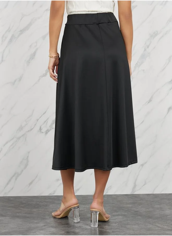 Styli Solid Elastic Waistband A-Line Midi Skirt with Pocket Detail
