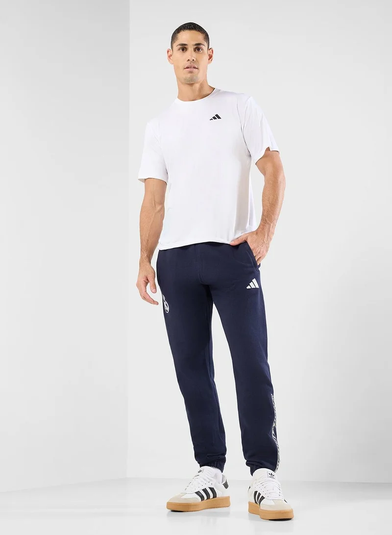adidas بنطلون رجالي أزرق