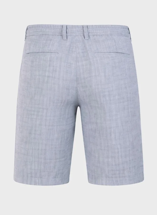 The Indian Garage Co  Men Regular Fit Solid Cross Pocket Mid-Rise Shorts  | Best Price UAE