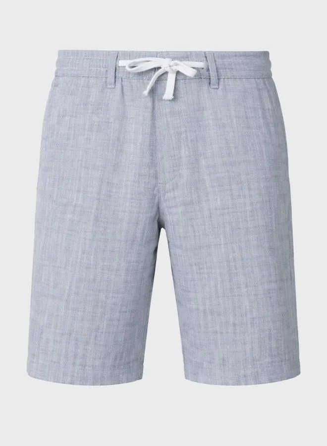 The Indian Garage Co  Men Regular Fit Solid Cross Pocket Mid-Rise Shorts  | Best Price UAE