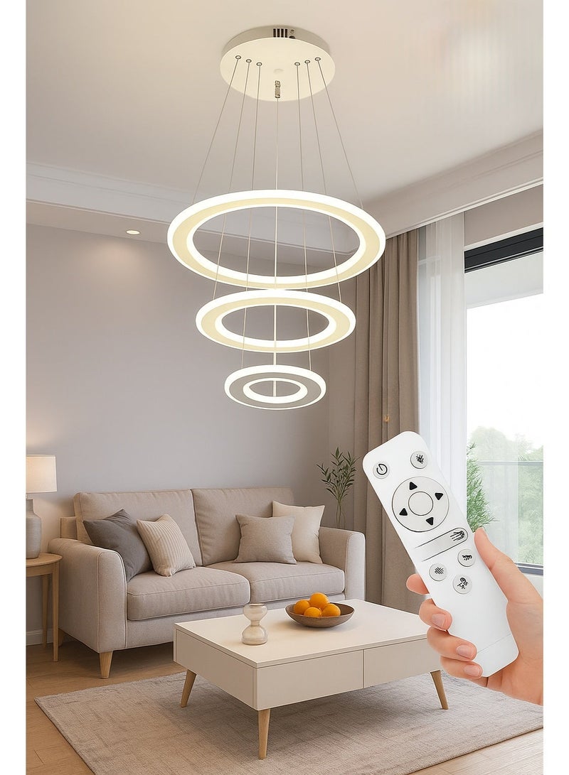 الثريات ثريا بتصميم هندسي عصري يتكون من حلقات LED دائرية معلقة بأسلاك رفيعة،3 ألوان متدرجة من الإنارة،ثريا LED متوافقة مع المساحات الداخلية،مثالية لغرفة المعيشة وغرفة الطعام - Image 3