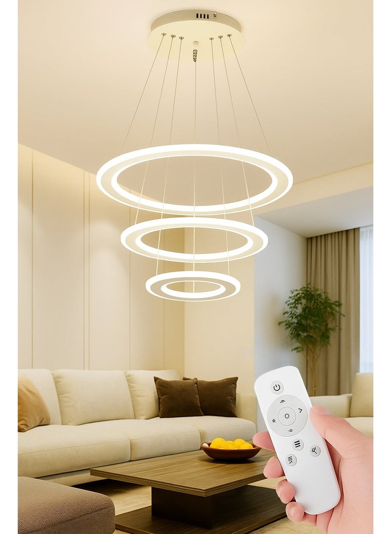 الثريات ثريا بتصميم هندسي عصري يتكون من حلقات LED دائرية معلقة بأسلاك رفيعة،3 ألوان متدرجة من الإنارة،ثريا LED متوافقة مع المساحات الداخلية،مثالية لغرفة المعيشة وغرفة الطعام - Image 1