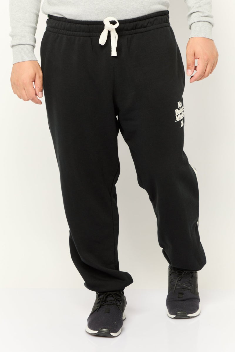 New Balance Men Sportswear Fit Outdoor Sweatpants, Black  - Image 1
