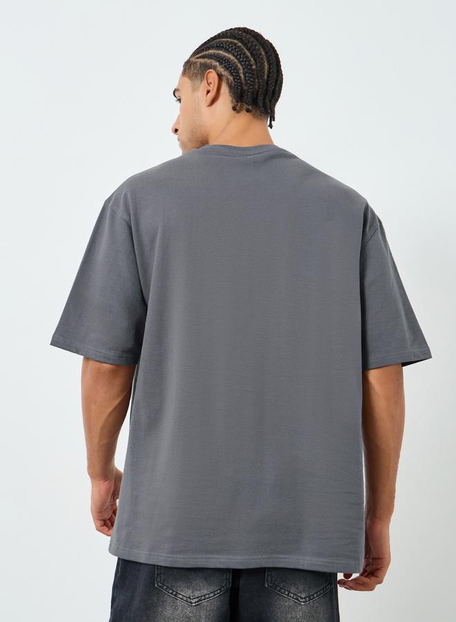 Styli Men Oversized Cursive Graphic Print T-Shirt - Image 4