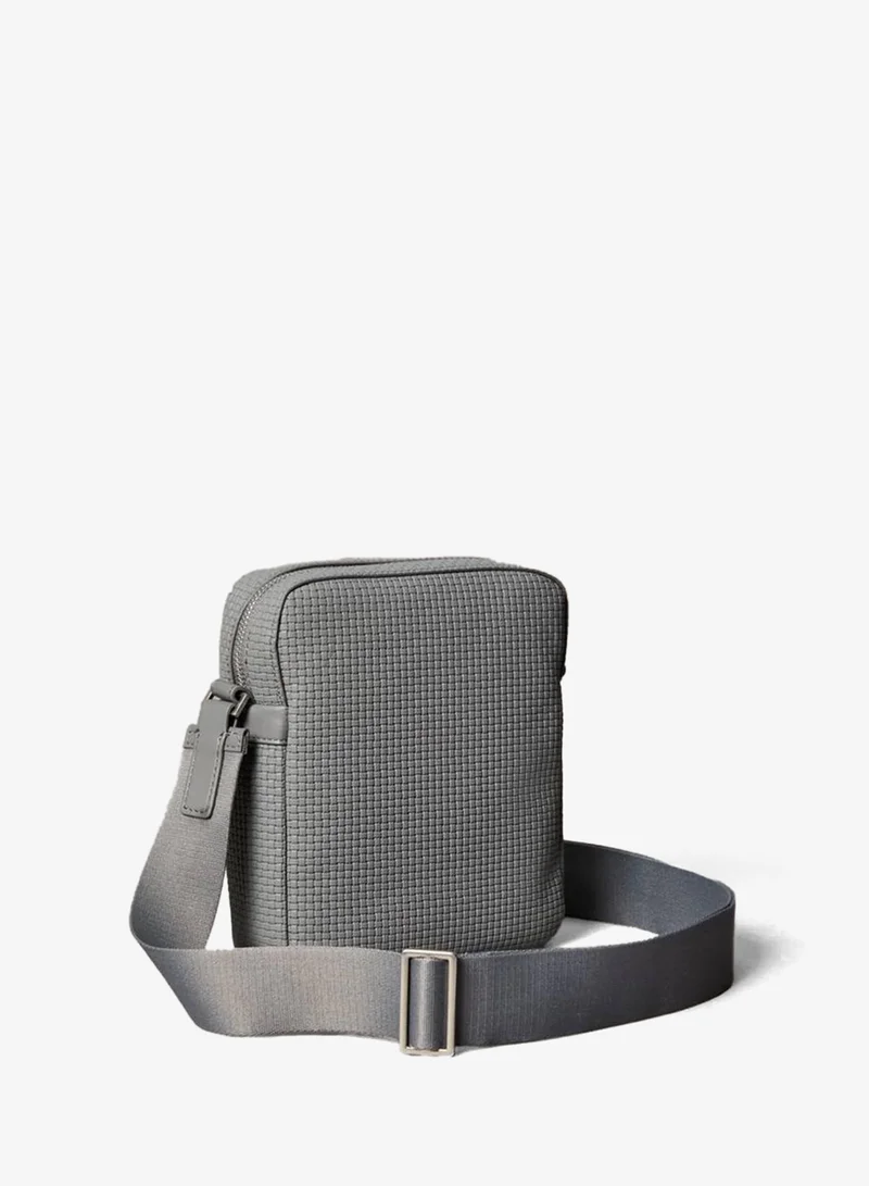 Calvin Klein Embossed Emblem Logo Reporter Bag