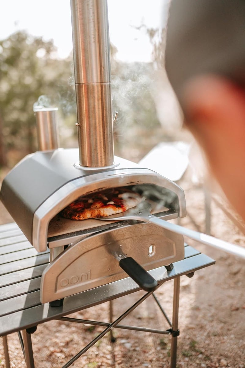 ooni مقلاة بيتزا دوارة - مقلاة بيتزا مصنوعة من الألمنيوم المثقب بحجم 7 بوصات، أداة خفيفة الوزن لقلب البيتزا بمقبض طويل، أدوات بيتزا، ملحقات فرن البيتزا - Image 4