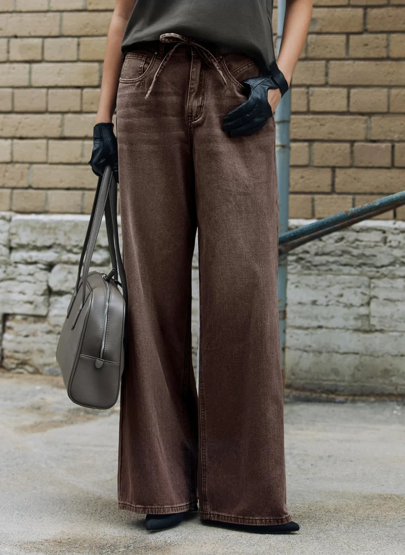 Lichi Loose distressed jeans with waist ties