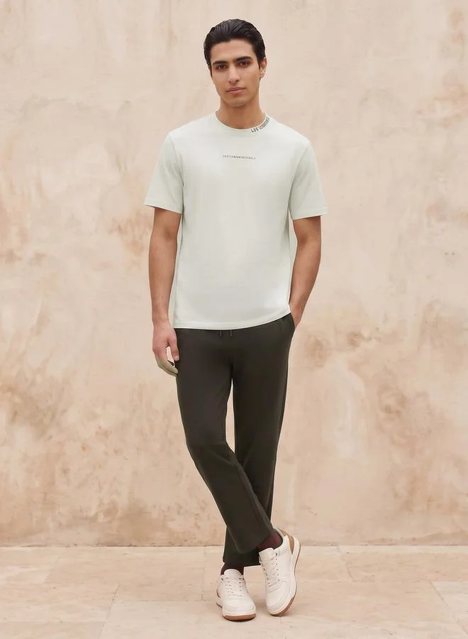 Lee Cooper Cream Lee Cooper Regular Fit Crew Neck Short Sleeves Logo Print T-shirt for Men | Best Price UAE