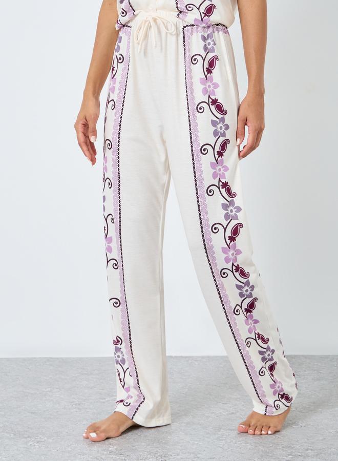 ستايلي طقم من بنطال بيجاما وبلوزة بطبعة زهور - Image 5