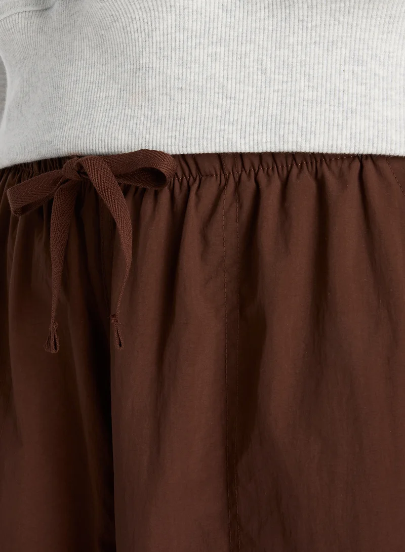 New Balance Essential Woven Cargo Pants