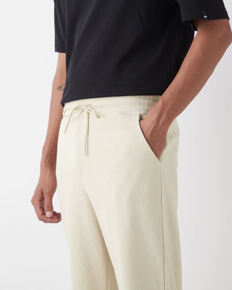 bewakoof Men's Beige Textured Oversized Parachute Pants - Image 5