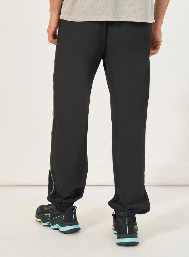 Styli 4-Way Stretch Woven Cargo Fit Training Track Pants with Contrast Piping Detail