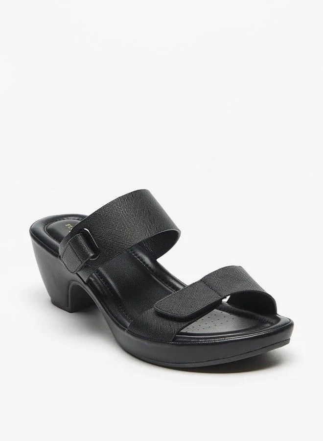 فلورا بيلا من شو إكسبرس صنادل سلايدز بطبعات بارزة وكعب عريض