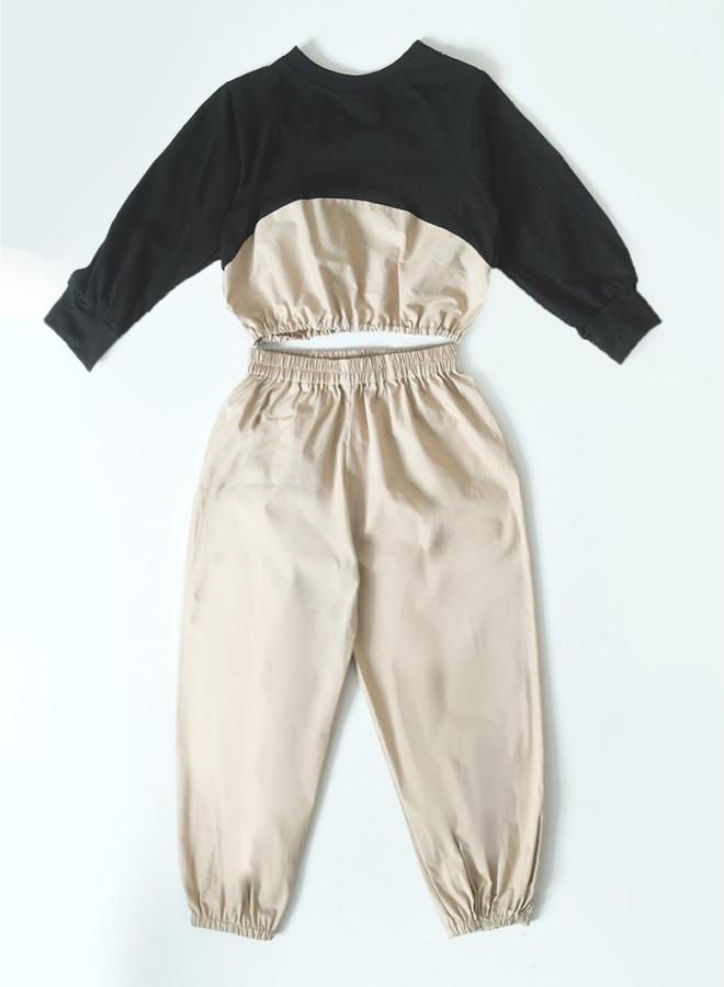 بيلا مودا طقم منسق من بنطال مع بلوزة بياقة دائرية - Image 2