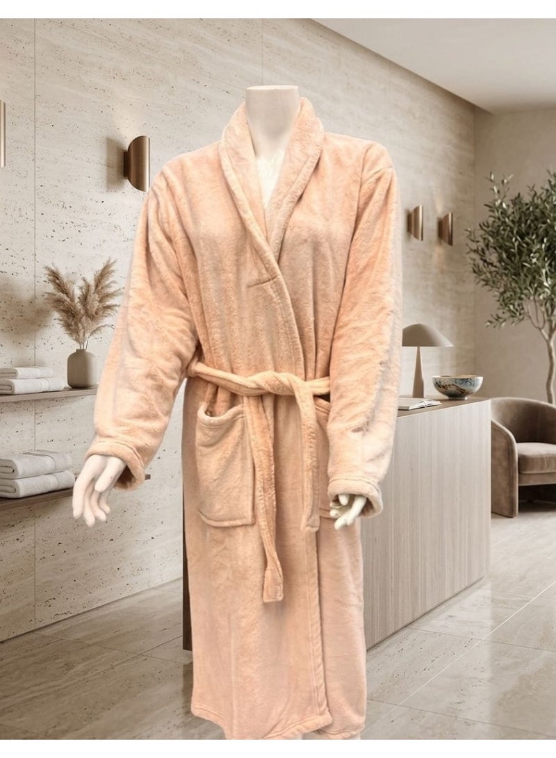 A long women's bathrobe in light pink (powder) color, featuring an elegant design and a soft texture that provides comfort and warmth.