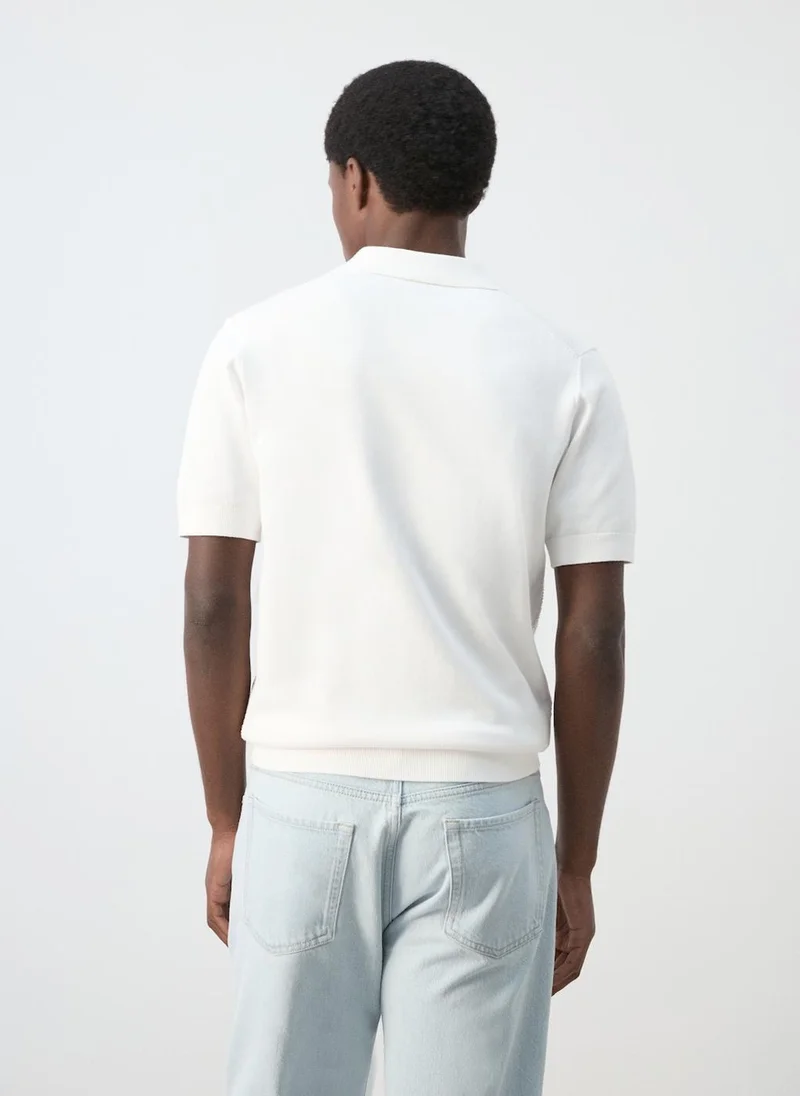 Mango Man Knitted polo shirt with zipper and lace accents