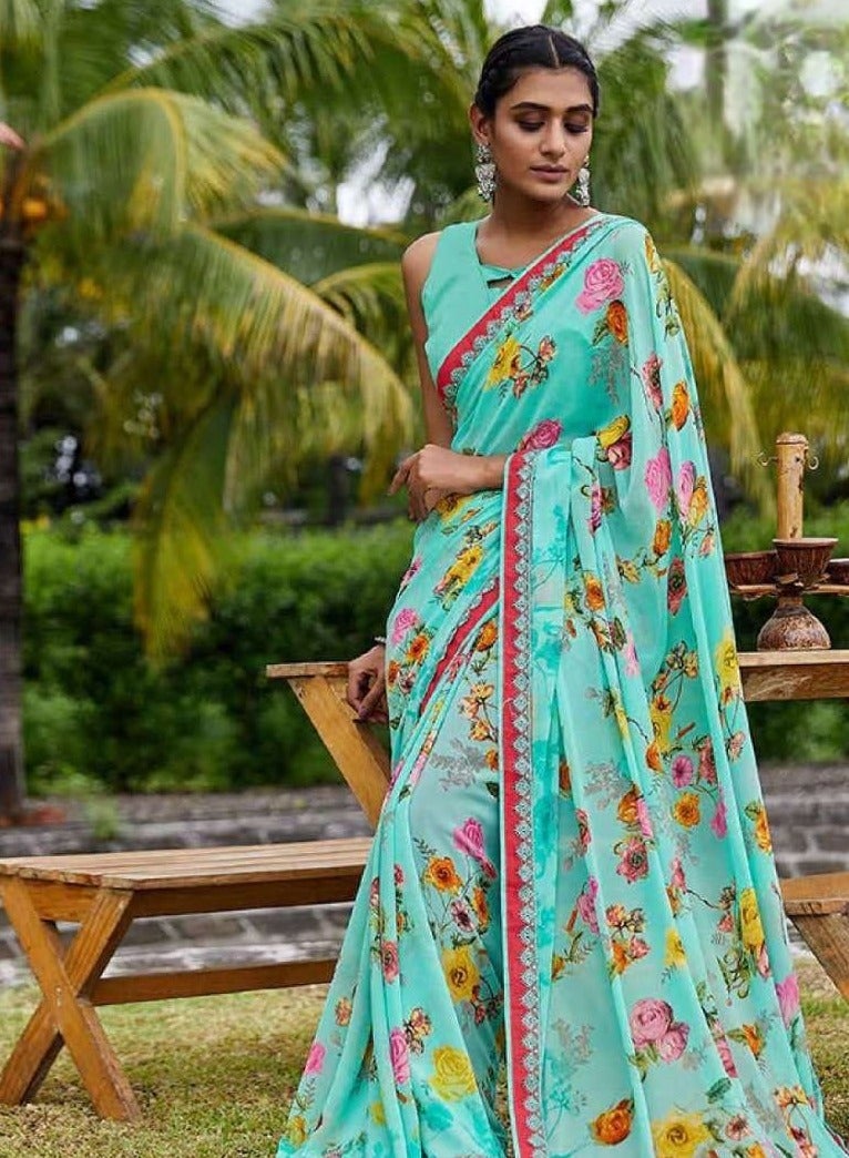 Grab Mantra Georgette Light Blue Sari With floral Print And Lace Border All Over With Unstitched Blouse  - Image 3
