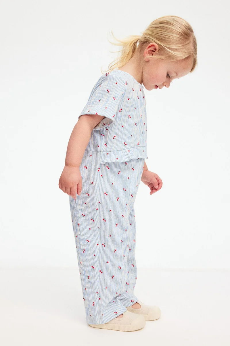 H&M Crinkled romper suit