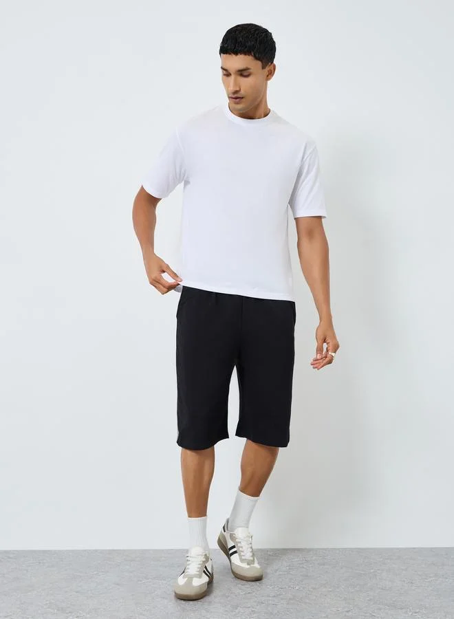 Styli Men Oversized Side Tape Terry Shorts