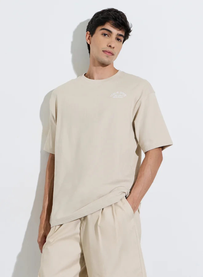 Styli  Men Beige Tennis Graphic Print Oversized T-Shirt for Men | Best Price UAE