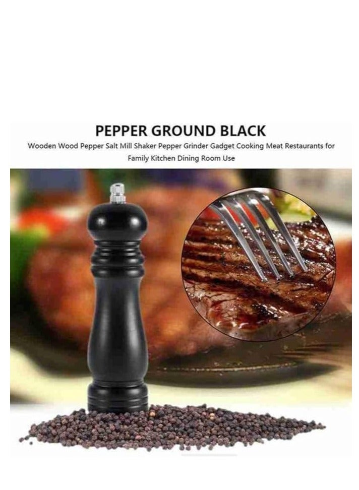 A traditional refillable salt or pepper grinder with an adjustable mechanism, featuring a classic black pepper mill design. Perfect for adding freshly ground seasoning to your meals with ease and style. - Image 1