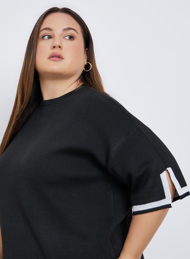 ستايلي بلوزة محبوكة واسعة بتفاصيل متباينة وكتف منخفض - Image 4