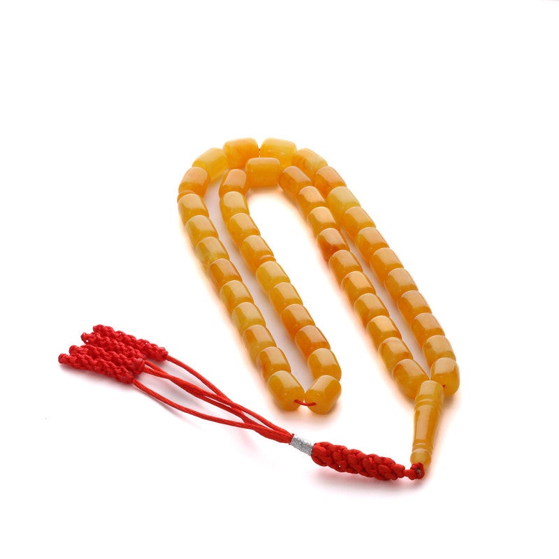 RS Polish Amber Dust Misbaha, Amber Color, 45 Beads, with Red Tassel - Image 1