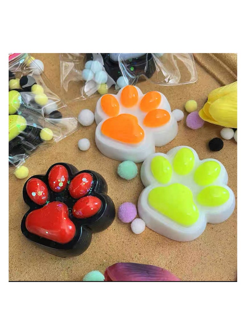 سكويشي مخلب قطة (Cat Paw Squishy)التصميم: سكويشي لطيف ومرح على شكل مخلب قطة، مصنوع من مادة ناعمة وقابلة للعصر. - Image 1