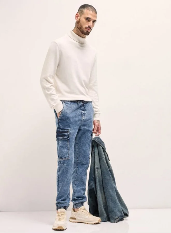 The Bear House  Men's Mid Blue Slim Fit Jogger-Style jean with Cargo Pockets Classic Comfort With Modern Style, Perfect For Everyday Casual Looks And Effortless Streetwear Vibes for Men | Best Price UAE