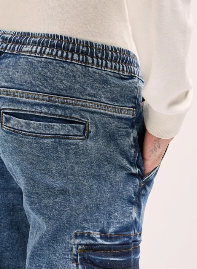The Bear House  Men's Mid Blue Slim Fit Jogger-Style jean with Cargo Pockets Classic Comfort With Modern Style, Perfect For Everyday Casual Looks And Effortless Streetwear Vibes for Men | Best Price UAE