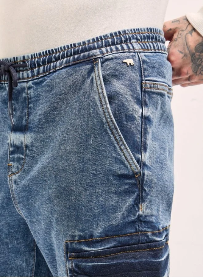 The Bear House  Men's Mid Blue Slim Fit Jogger-Style jean with Cargo Pockets Classic Comfort With Modern Style, Perfect For Everyday Casual Looks And Effortless Streetwear Vibes for Men | Best Price UAE