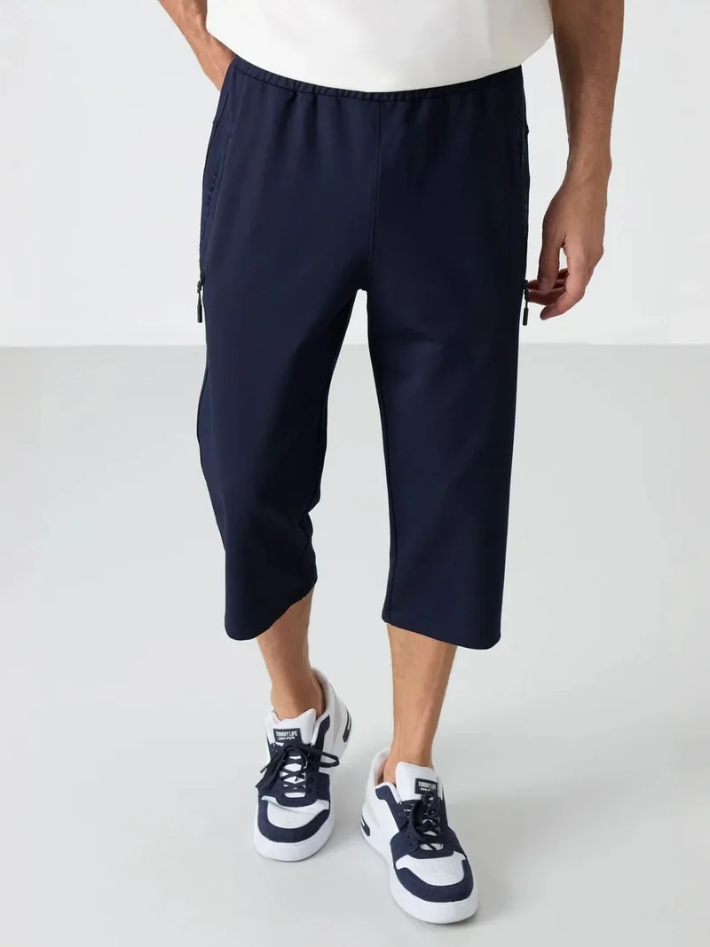 تومي لايف TOMMY Men's Capri Cycling Shorts