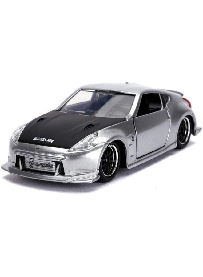لعبة جادا سريعة وغاضبة 2009 نيسان 370Z سيارة مصنوعة من المعدن مقاس 1:32، فضي