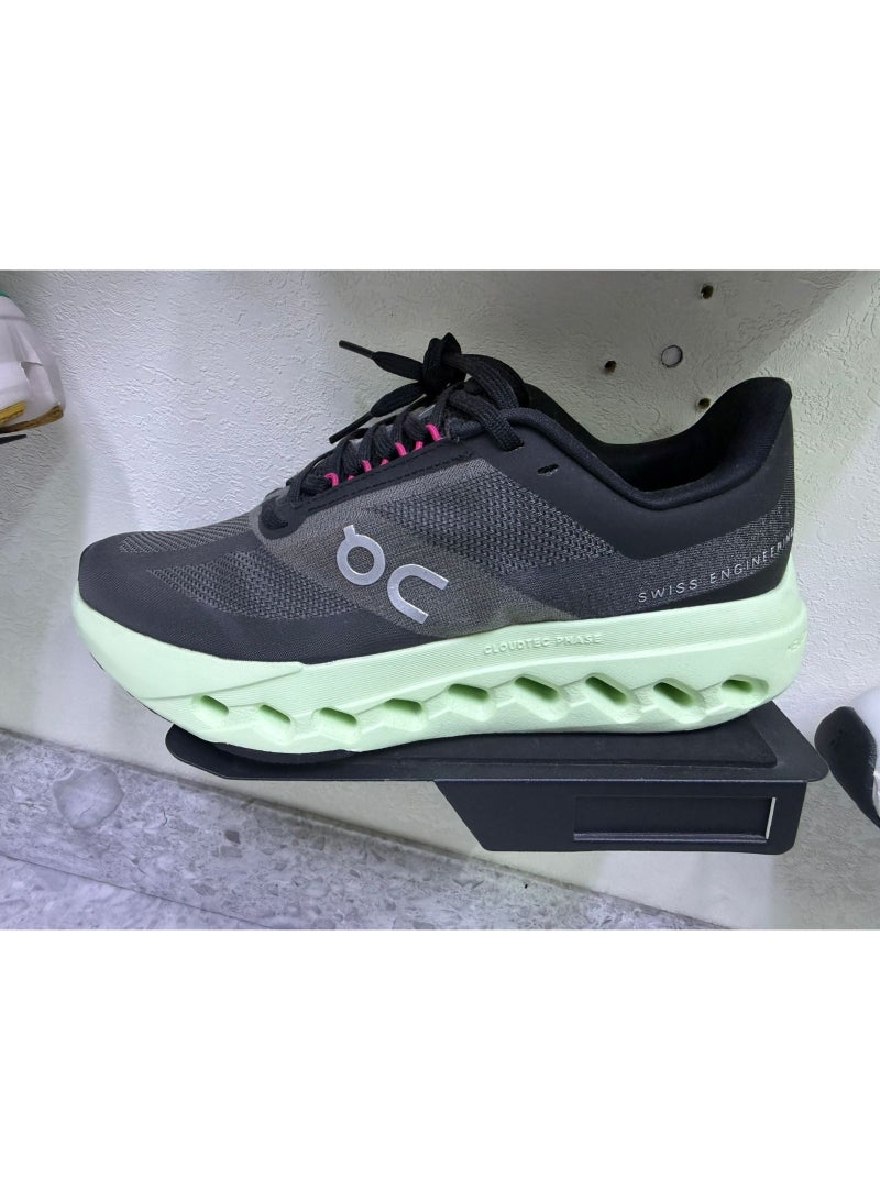 ON Cloudsurfer running trainers in black and lime