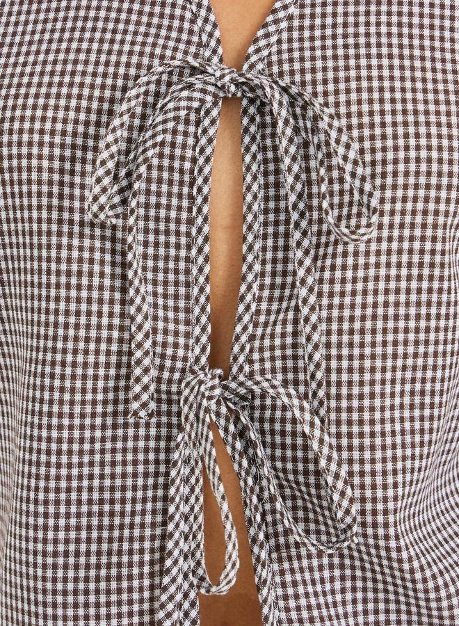 ستايلي بلوزة بلا أكمام بطبعات مربعات وربطة عنق - Image 3