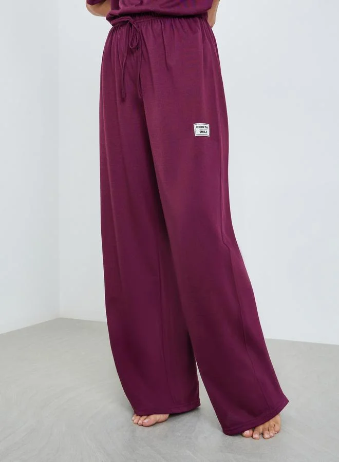 Styli  Women Burgundy Knitted T-Shirt and Pyjama Set for Women | Best Price UAE