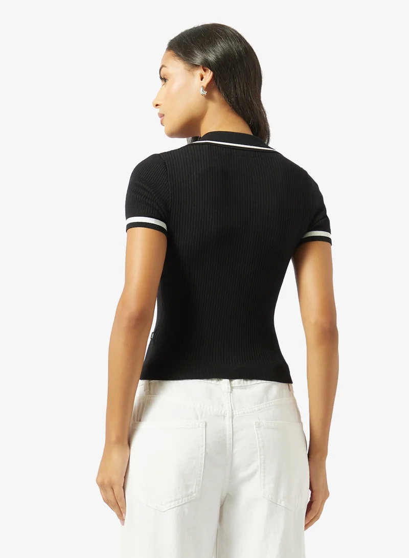 جيس جينز كنزة بياقة بولو