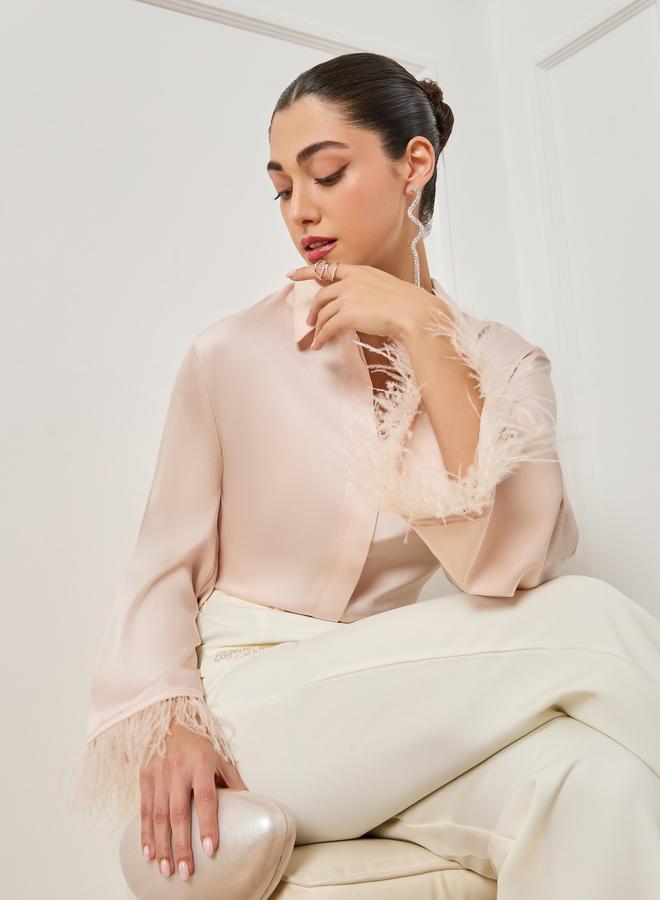 ستايلي بلوزة ساتان مزين بالريش لون كريمي - Image 1