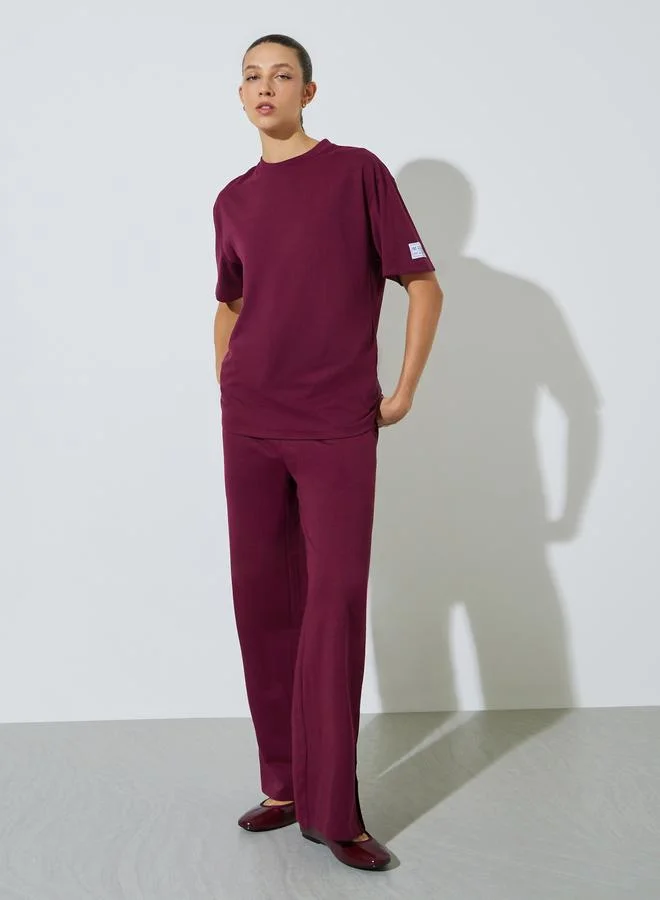 ستايلي Badge Detail T-Shirt and Wide Leg Joggers Co-Ords