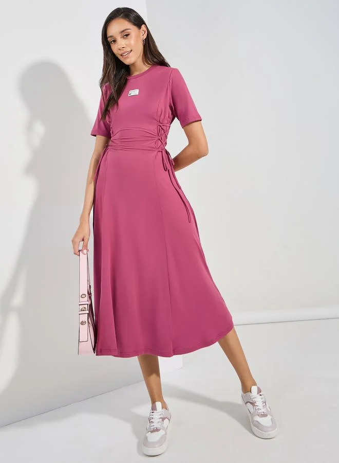 ستايلي Side Tie-Up T-Shirt Midi Dress with Patch Detail