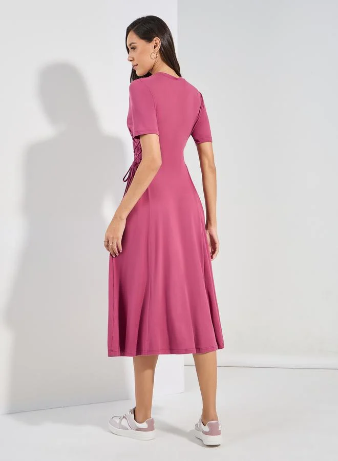 ستايلي Side Tie-Up T-Shirt Midi Dress with Patch Detail