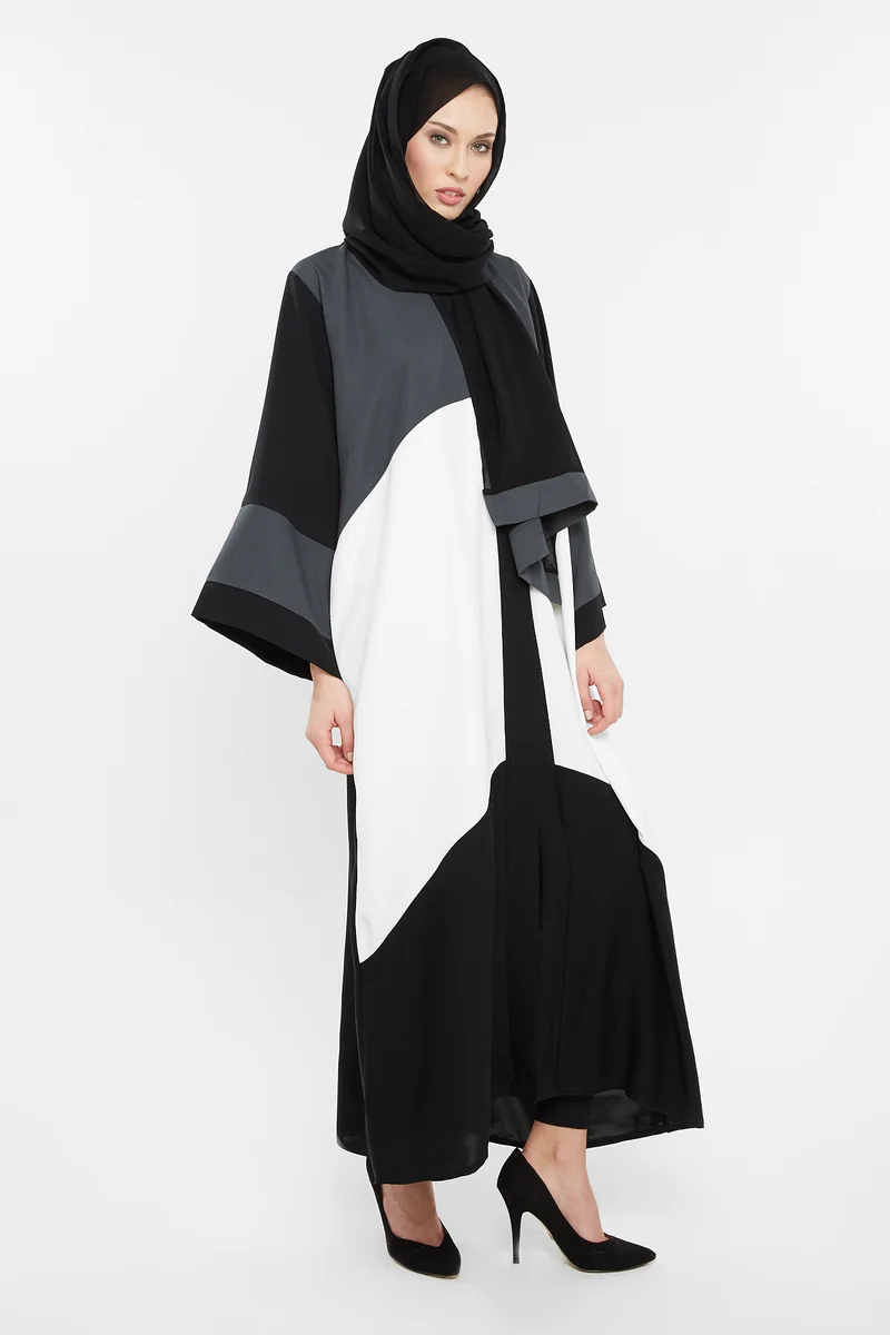 النخبة A casual duo-colored abaya in grey and white with cross cut detail -AJ152A