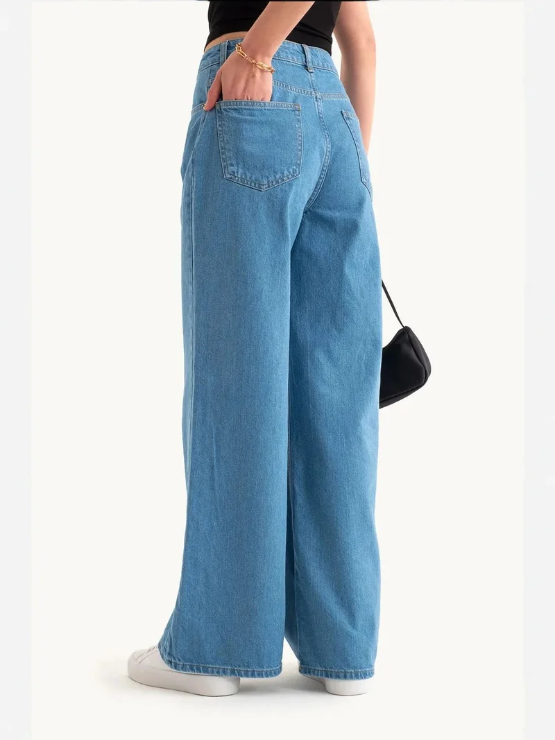 زوبعة جينز واسع جدا بخصر مرتفع